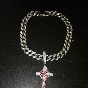 Cuban linked chocker with cross/snake pendant